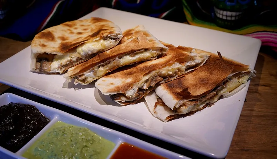 Mushroom and four cheese quesadilla with three salsas